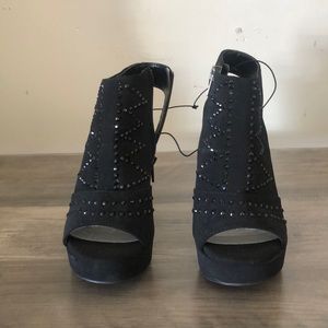 Never worn black peep toe wedges
